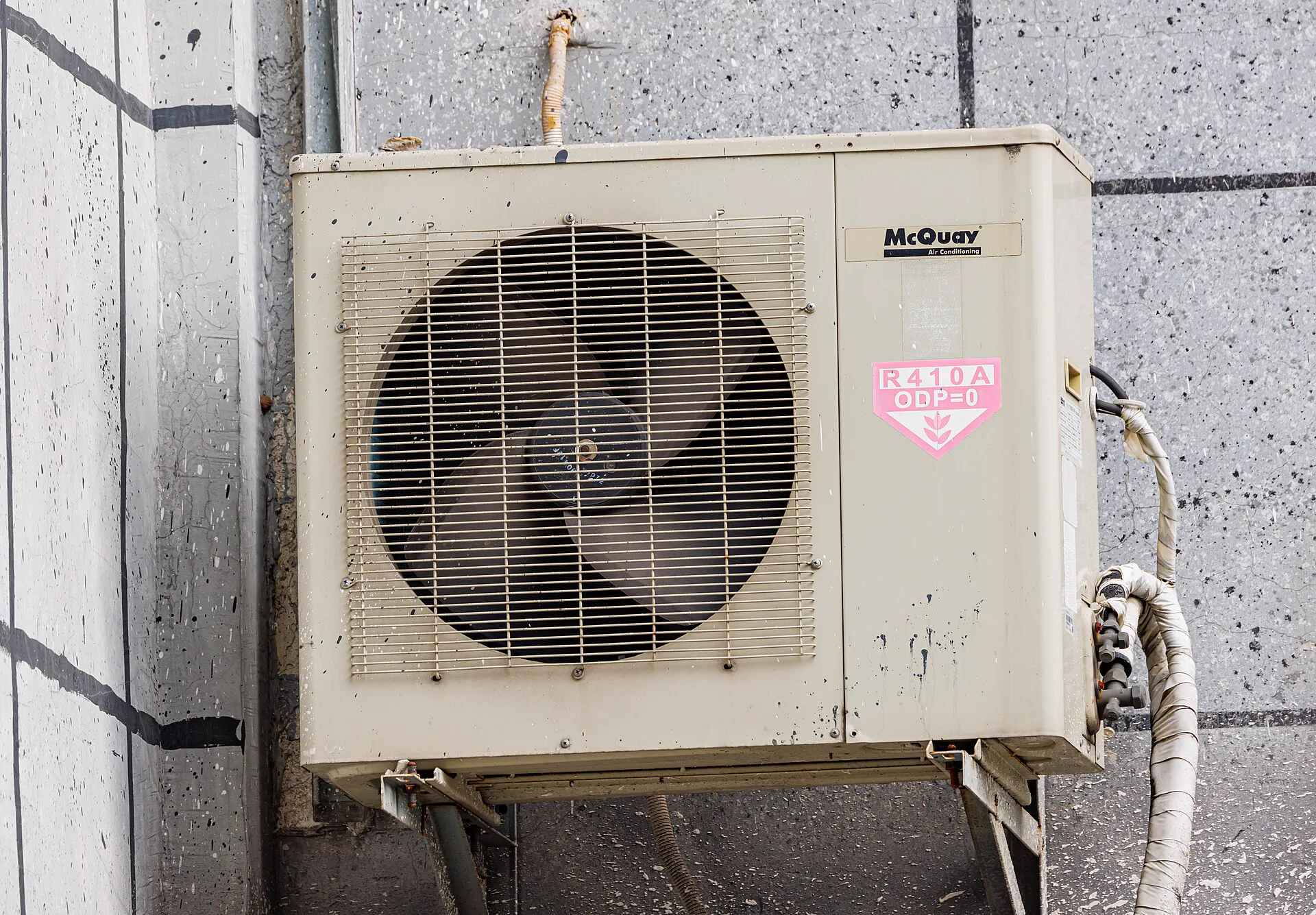 New central air conditioner on a level pad